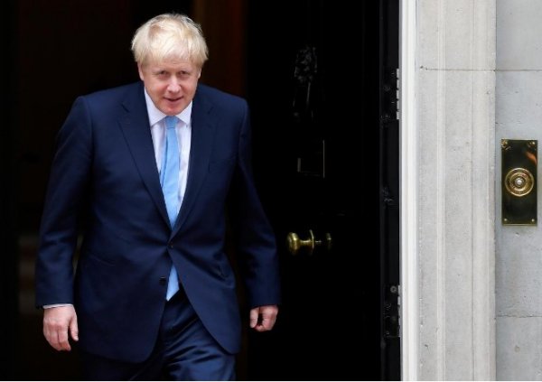 Johnson presses on lawmakers to back October 31 Brexit